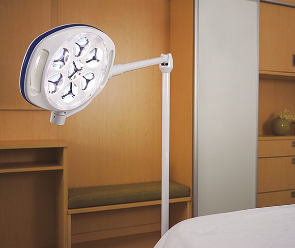 Skytron Spectra exam light on a stand next to near patient bed
